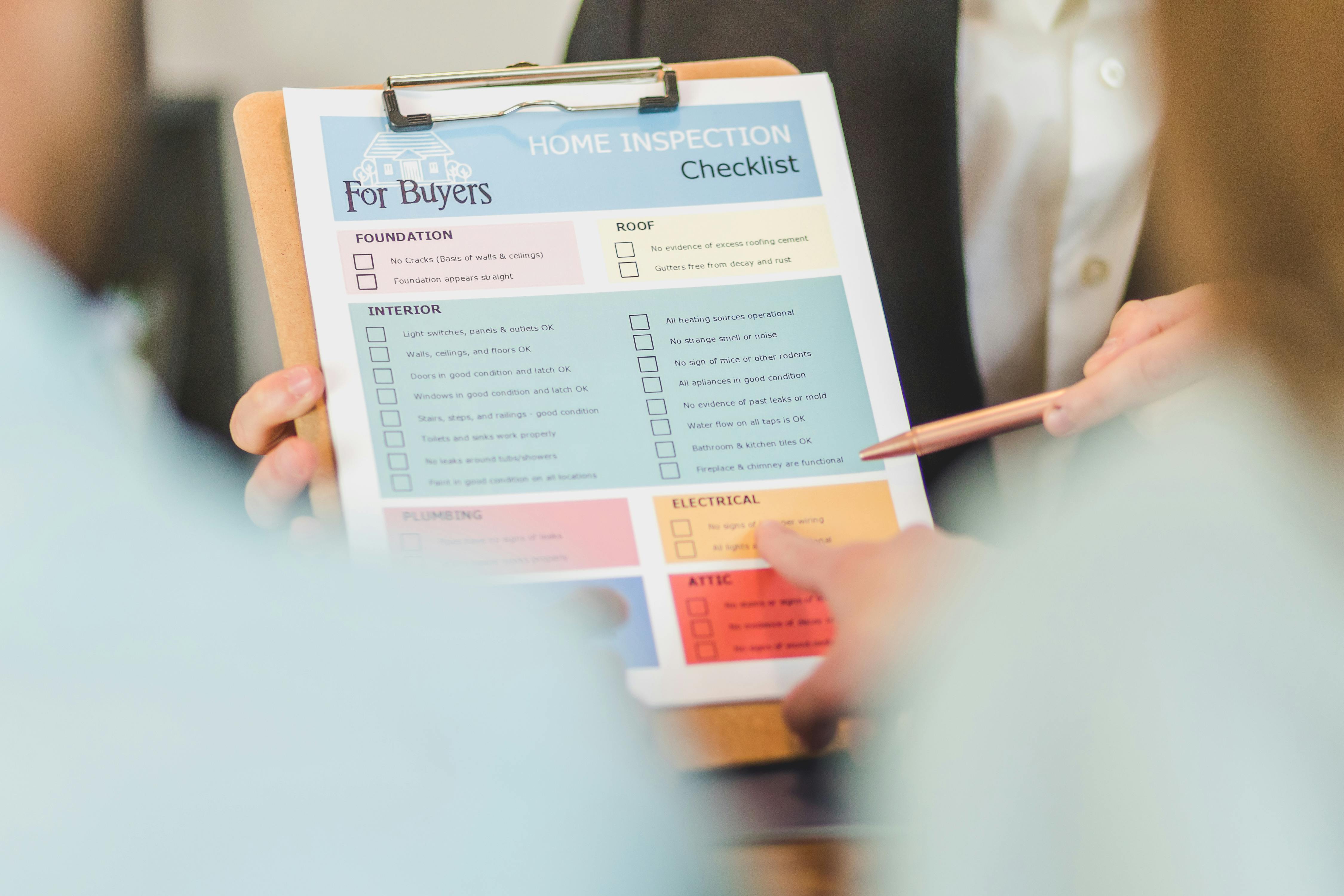 Technician with checklist inside a residential property
