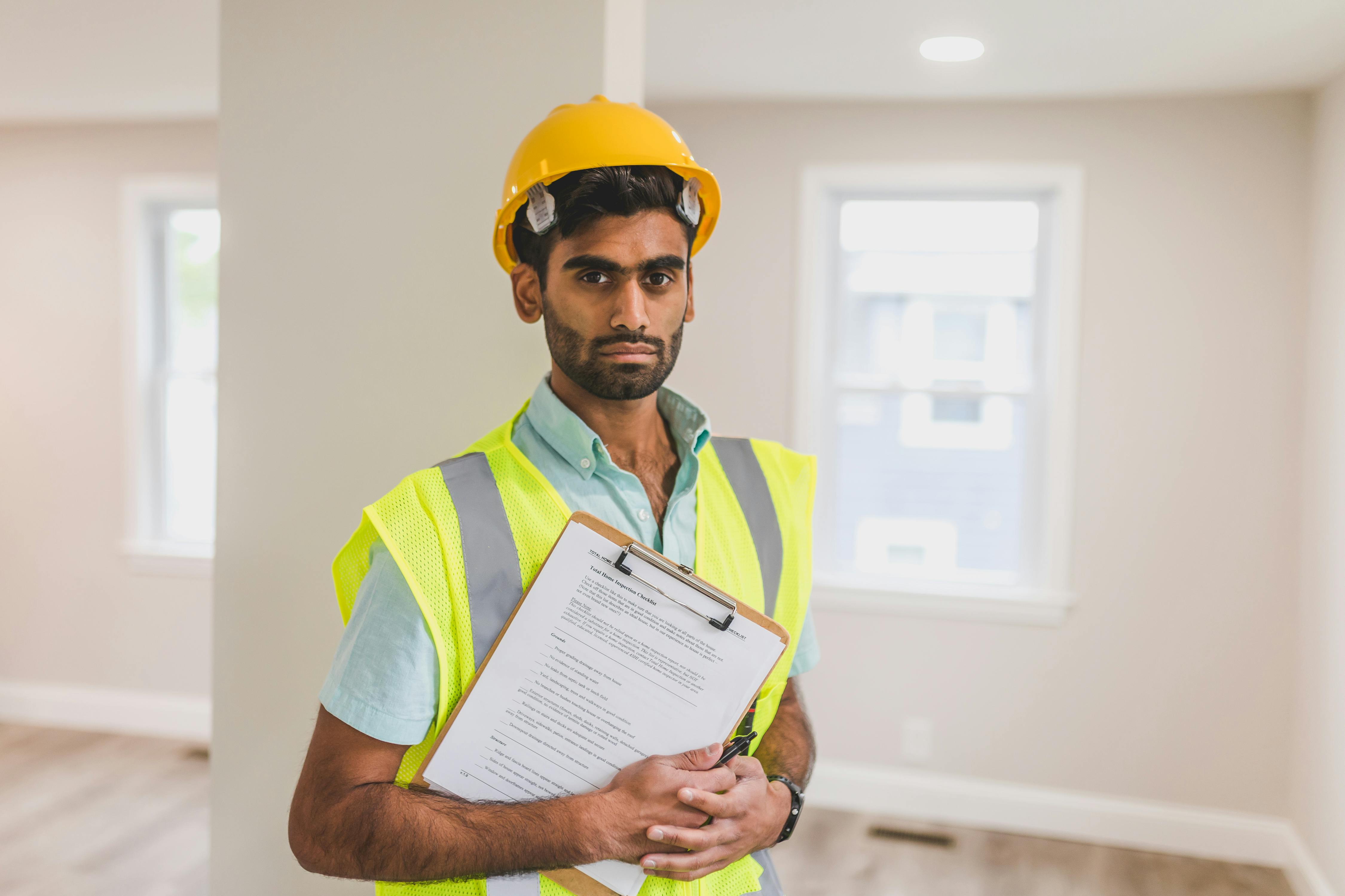 Technician consultation portrait inside a home